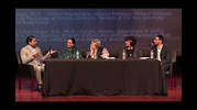 A group of people sitting at a table.