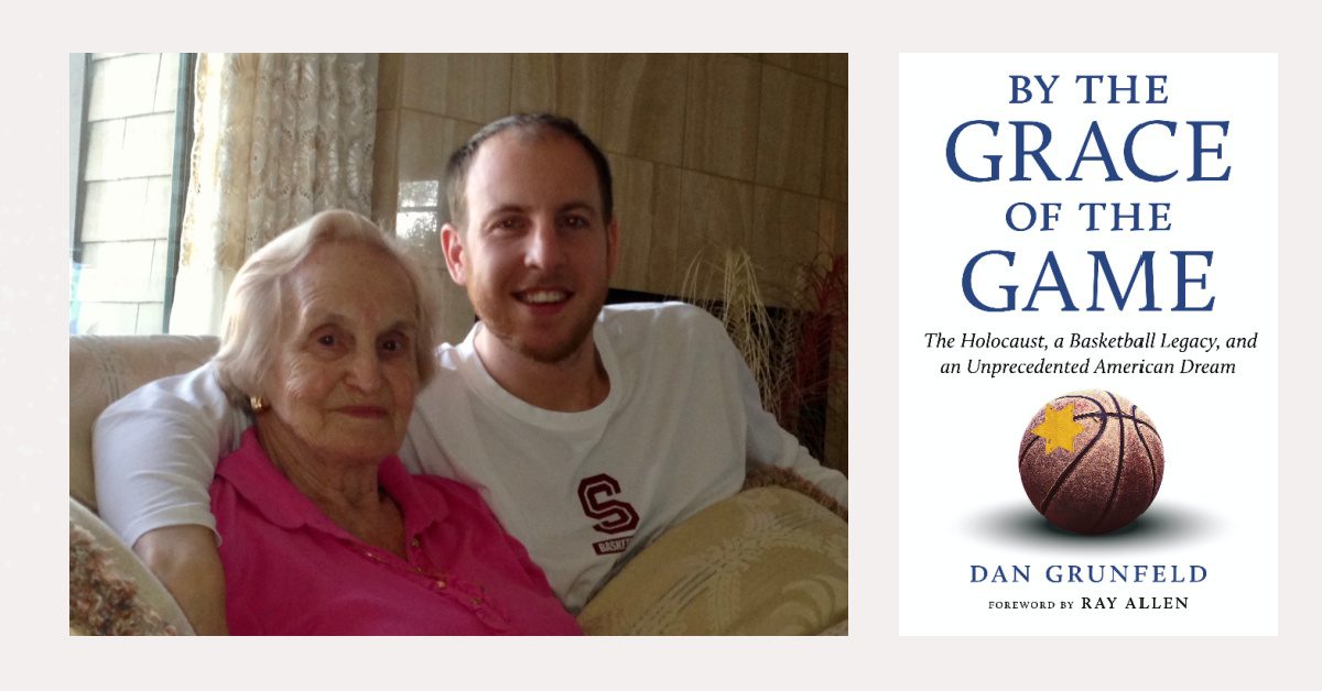 A man and woman sitting on the couch with a book.